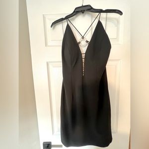 Strappy black mini dress by Aidan Mattox. Size 10 US, brand new no tags.